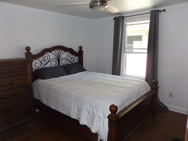 304 Edgewood Dr, Galax, VA 24333 - bedroom featuring wood finished floors, multiple windows, ceiling fan, and baseboards