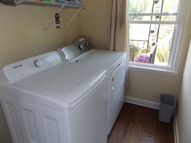 304 Edgewood Dr, Galax, VA 24333 - washroom with separate washer and dryer, dark wood-style floors, plenty of natural light, and baseboards