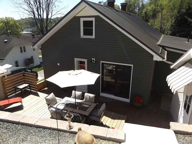 304 Edgewood Dr, Galax, VA 24333 - back of house featuring a wooden deck and a chimney