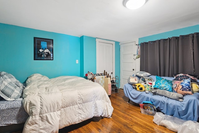 88 W Banner St, Lebanon, VA 24266 - bedroom featuring wood finished floors and a closet