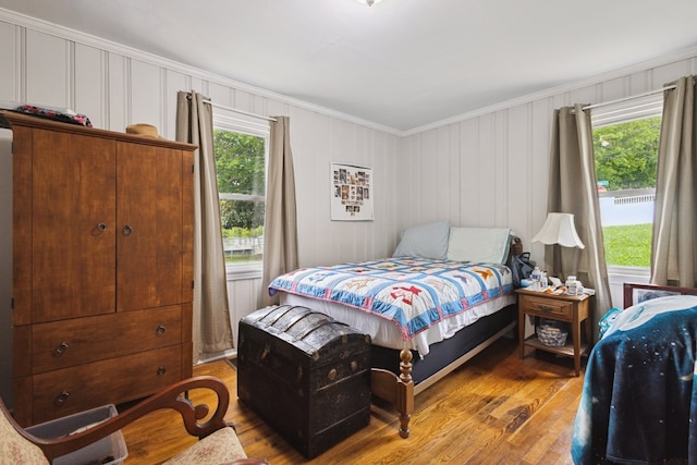 88 W Banner St, Lebanon, VA 24266 - bedroom with crown molding and wood finished floors