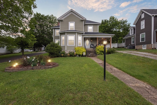 88 W Banner St, Lebanon, VA 24266 - view of front of home featuring covered porch, a front lawn, and driveway