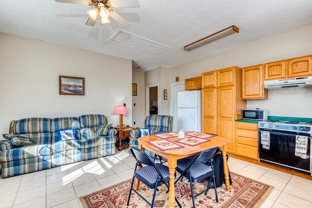 1386 Rocky Hollow Rd, Atkins, VA 24311 - dining space with light tile patterned floors and a ceiling fan