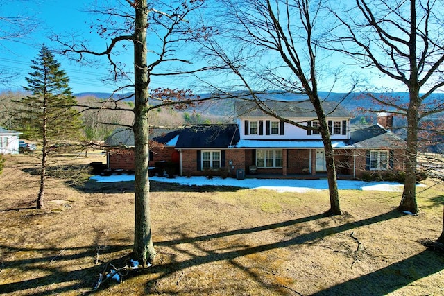 1386 Rocky Hollow Rd, Atkins, VA 24311 - traditional-style house featuring brick siding and a mountain view