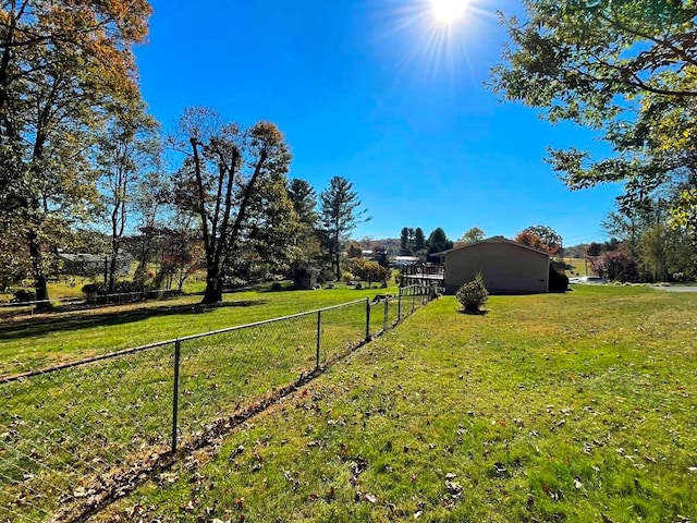 view of yard with a rural view