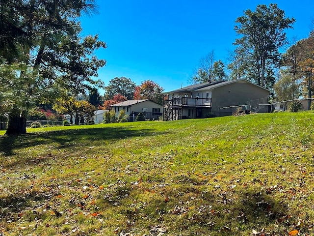 view of yard with a wooden deck