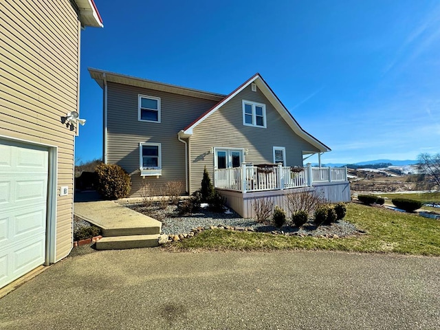 view of front of home with a mountain view