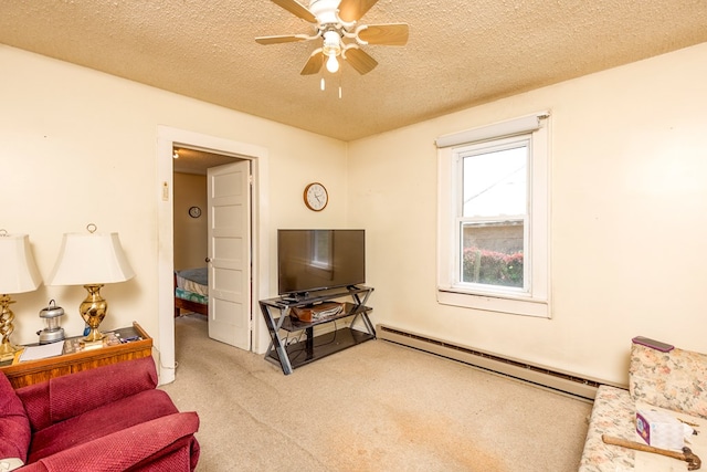 204 Elizabeth St, Bristol, TN 37620 - living area with baseboard heating, carpet flooring, a textured ceiling, and ceiling fan