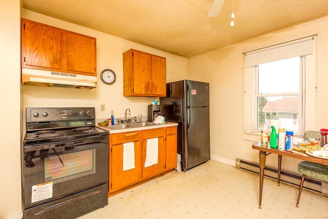 204 Elizabeth St, Bristol, TN 37620 - kitchen with under cabinet range hood, black appliances, a sink, brown cabinets, and a baseboard radiator
