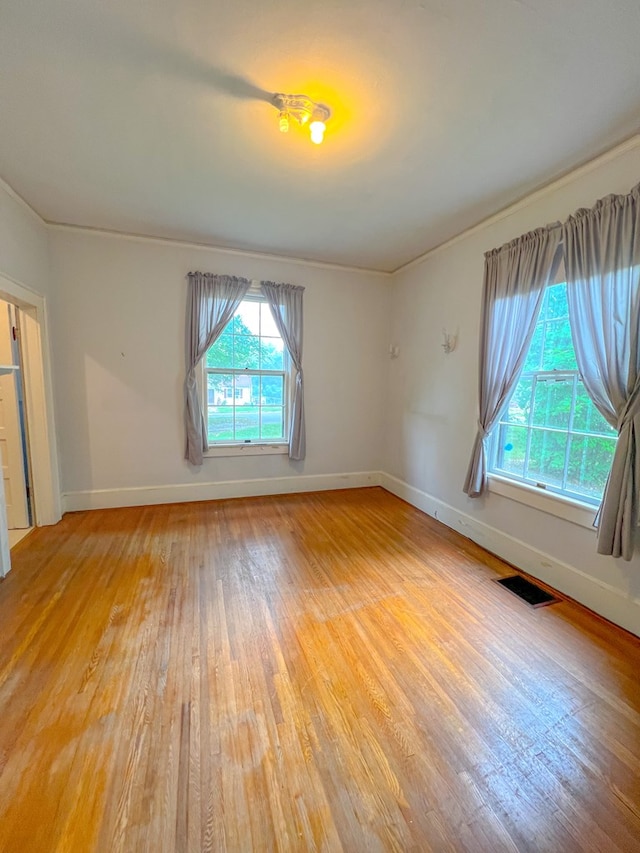 empty room with wood-type flooring