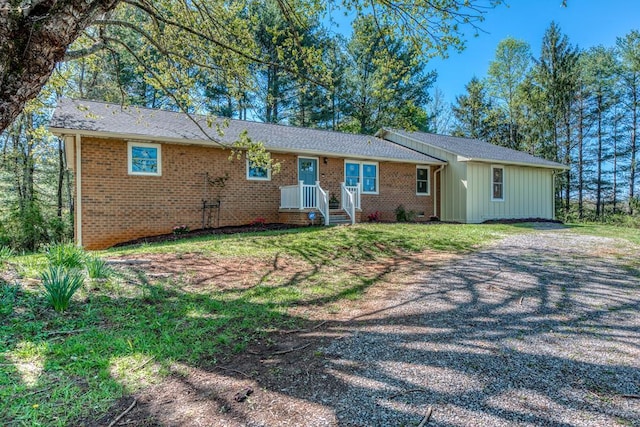 677 Summit Dr, Jonesborough, TN 37659 - single story home featuring board and batten siding and brick siding