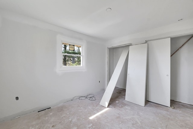677 Summit Dr, Jonesborough, TN 37659 - unfurnished bedroom with multiple closets