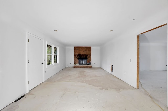 677 Summit Dr, Jonesborough, TN 37659 - unfurnished living room with concrete flooring and a fireplace