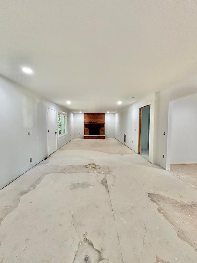 677 Summit Dr, Jonesborough, TN 37659 - unfurnished living room with a fireplace and recessed lighting