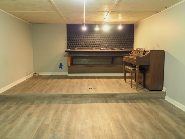 living room featuring baseboards and wood finished floors