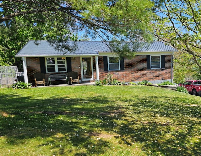 290 Hummingbird Hl, Tazewell, VA 24651 - ranch-style house featuring brick siding, metal roof, and covered porch