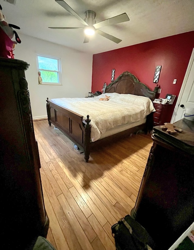 290 Hummingbird Hl, Tazewell, VA 24651 - bedroom featuring light wood-style flooring and ceiling fan
