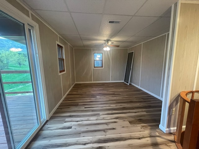 3747 Mountain Rd, Cedar Bluff, VA 24609 - spare room featuring wood finished floors, ceiling fan, baseboards, and a paneled ceiling