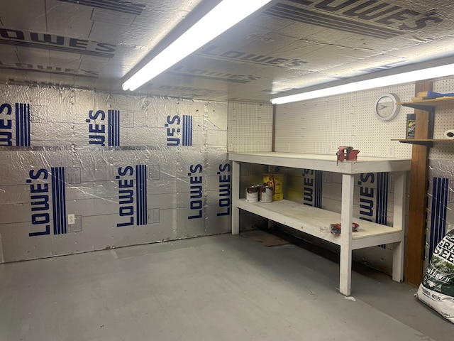 3747 Mountain Rd, Cedar Bluff, VA 24609 - miscellaneous room featuring a workshop area and concrete floors
