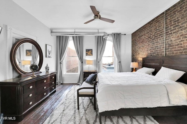 24 6th St, Bristol, TN 37620 - bedroom with brick wall, a ceiling fan, and wood finished floors
