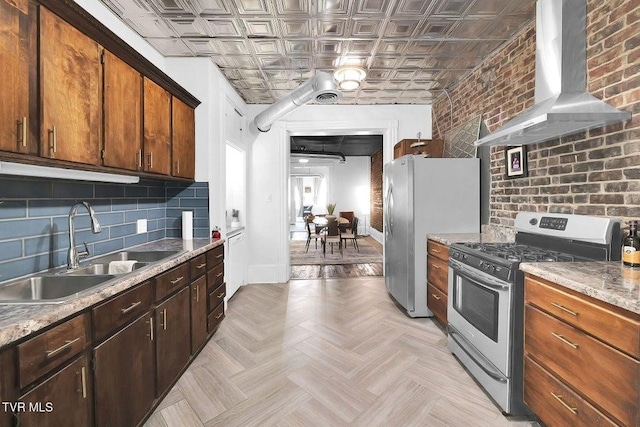 24 6th St, Bristol, TN 37620 - kitchen featuring a sink, an ornate ceiling, wall chimney exhaust hood, tasteful backsplash, and appliances with stainless steel finishes