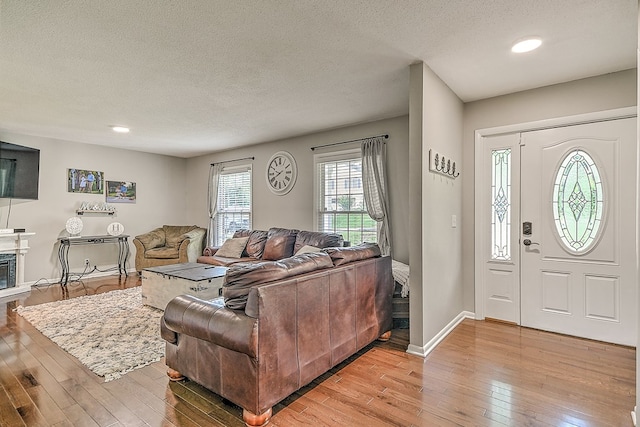420 Brookwood Dr, Bristol, TN 37620 - entrance foyer with light wood-style flooring, a textured ceiling, and recessed lighting
