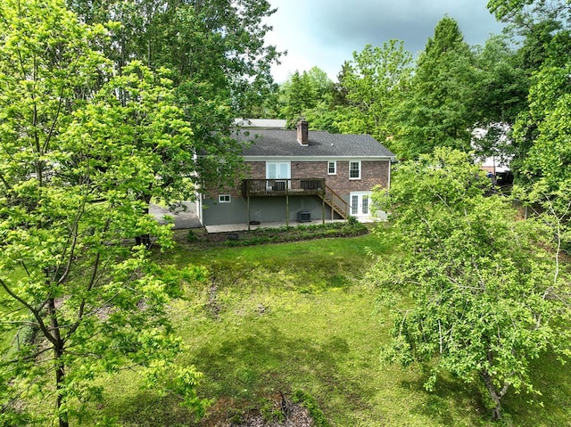 420 Brookwood Dr, Bristol, TN 37620 - back of house with stairway, a wooden deck, and a chimney