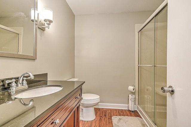 420 Brookwood Dr, Bristol, TN 37620 - full bath featuring an enclosed shower, wood finished floors, and vanity