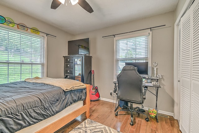 420 Brookwood Dr, Bristol, TN 37620 - bedroom featuring a closet, wood finished floors, and a ceiling fan
