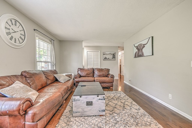 420 Brookwood Dr, Bristol, TN 37620 - living room featuring dark wood-style floors and a textured ceiling