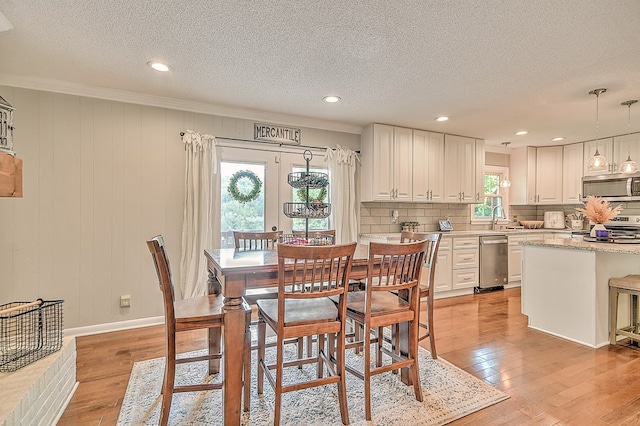 420 Brookwood Dr, Bristol, TN 37620 - dining room with light wood finished floors, a textured ceiling, ornamental molding, and recessed lighting
