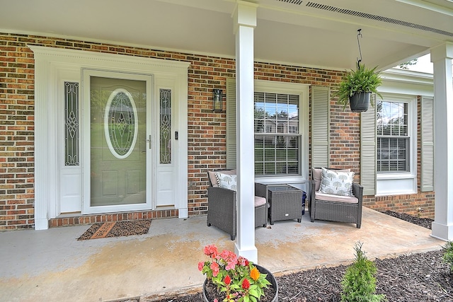 420 Brookwood Dr, Bristol, TN 37620 - view of exterior entry featuring brick siding and covered porch