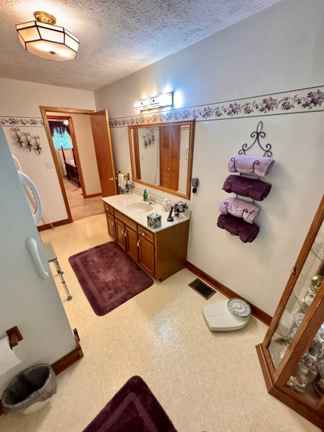 2989 Greenbrier Rd, Haysi, VA 24256 - bathroom featuring vanity and a textured ceiling
