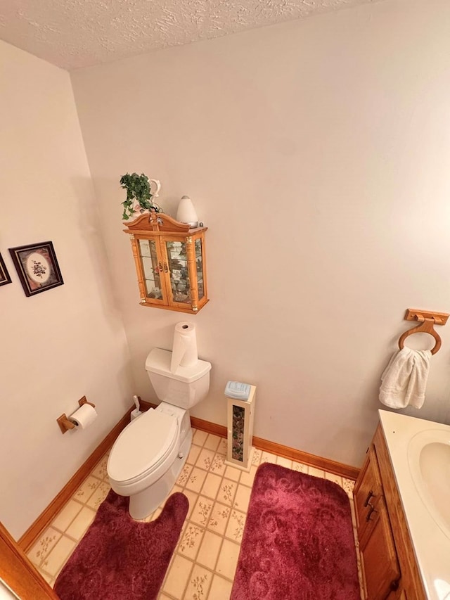 2989 Greenbrier Rd, Haysi, VA 24256 - bathroom with vanity, a textured ceiling, and tile patterned floors
