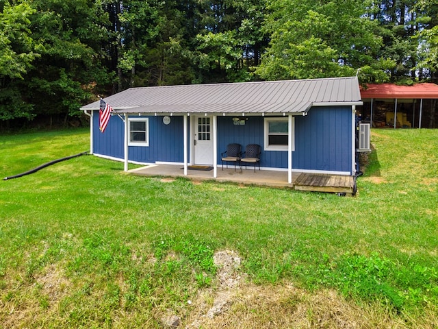 21468 Mandalay Ln, Abingdon, VA 24211 - view of front of property featuring a front yard, a metal roof, and board and batten siding
