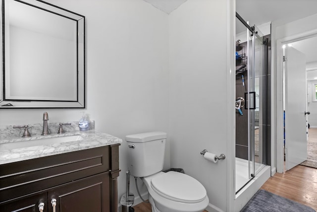 21468 Mandalay Ln, Abingdon, VA 24211 - bathroom featuring vanity, wood finished floors, and a stall shower