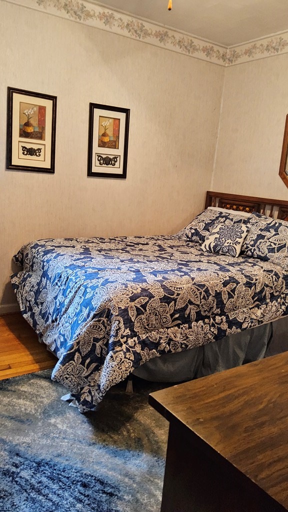 1359 Scratch Gravel Rd, Marion, VA 24354 - bedroom featuring wood finished floors