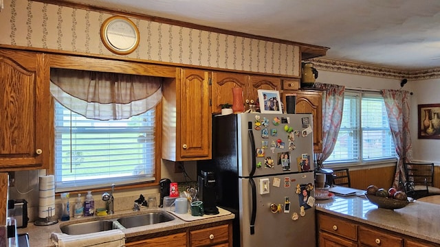 1359 Scratch Gravel Rd, Marion, VA 24354 - kitchen featuring freestanding refrigerator, brown cabinets, and light countertops