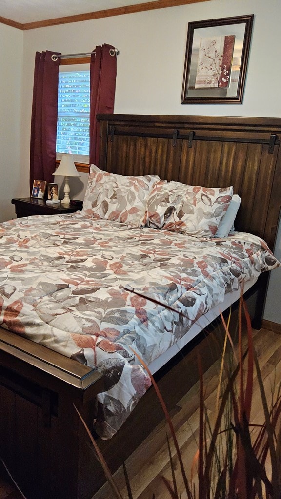 1359 Scratch Gravel Rd, Marion, VA 24354 - bedroom with ornamental molding and wood finished floors