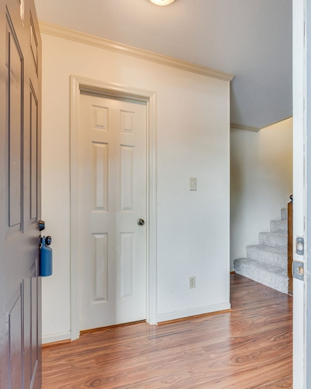 151 Woodcrest Ln, Bristol, VA 24201 - entrance foyer featuring crown molding, light wood-type flooring, and stairs