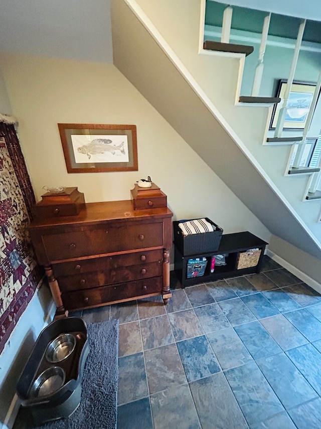 18335 Westwood Dr, Abingdon, VA 24211 - bedroom featuring baseboards and dark stone finish flooring