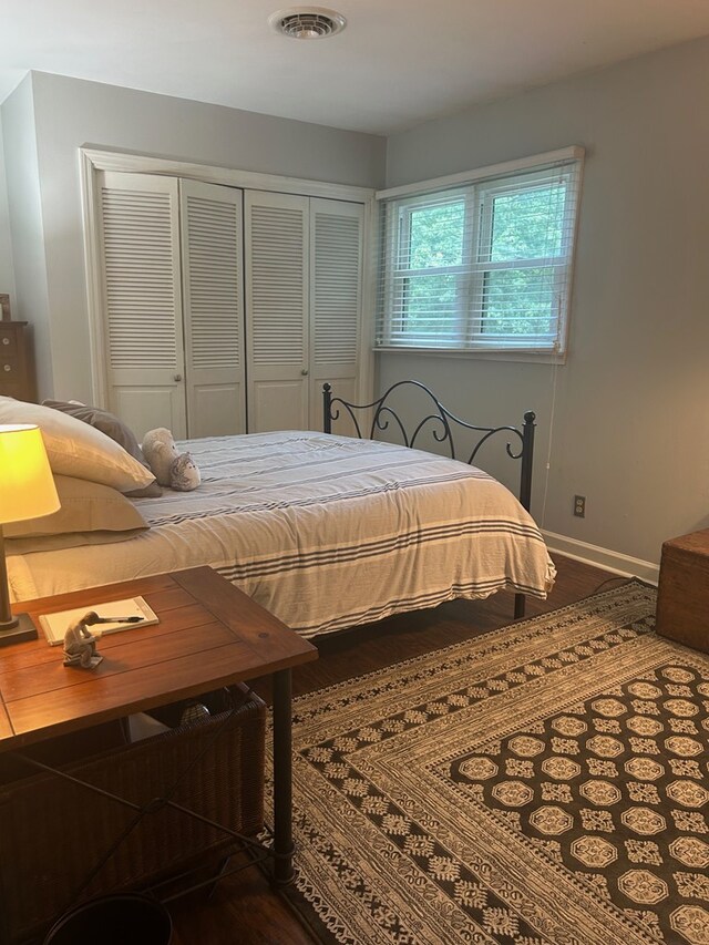 18335 Westwood Dr, Abingdon, VA 24211 - bedroom featuring dark wood-style flooring and a closet
