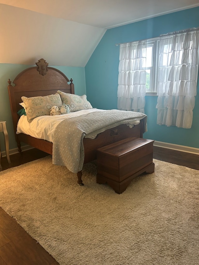 18335 Westwood Dr, Abingdon, VA 24211 - bedroom featuring wood finished floors and vaulted ceiling