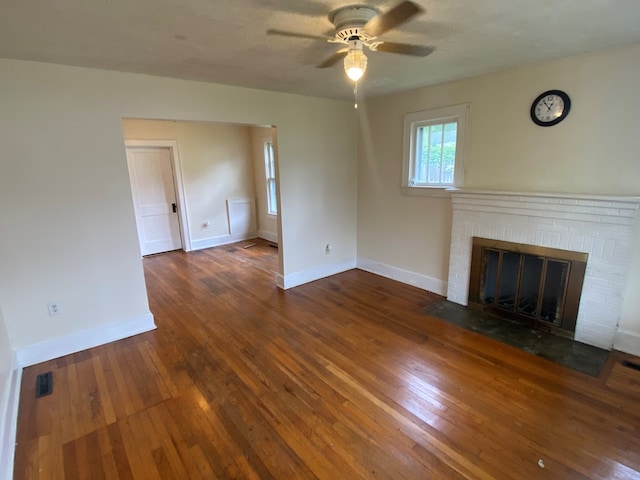 250 Staley St, Marion, VA 24354 - unfurnished living room featuring ceiling fan, a fireplace, and wood finished floors