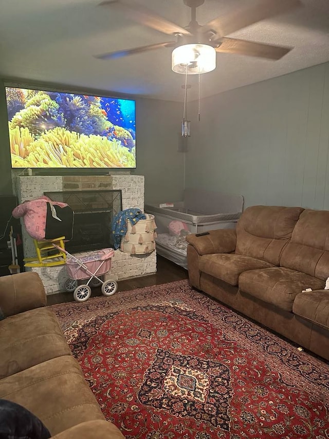 148 Rockspray Dr, Wytheville, VA 24382 - living area with a ceiling fan and a fireplace
