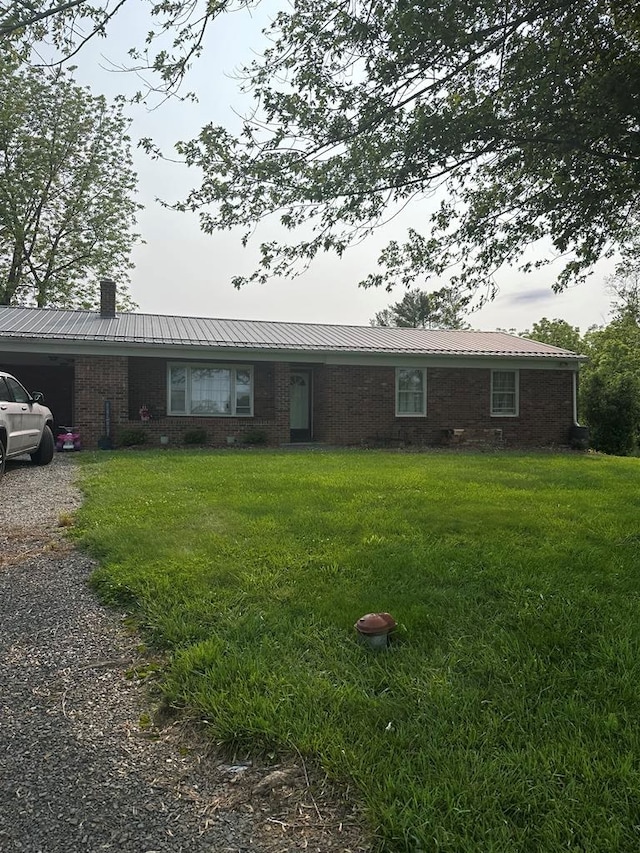 148 Rockspray Dr, Wytheville, VA 24382 - ranch-style home with a chimney, a front lawn, a metal roof, and brick siding