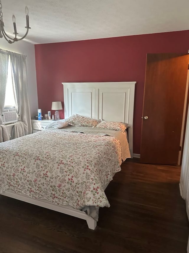 148 Rockspray Dr, Wytheville, VA 24382 - bedroom with dark wood-style floors, a chandelier, and cooling unit
