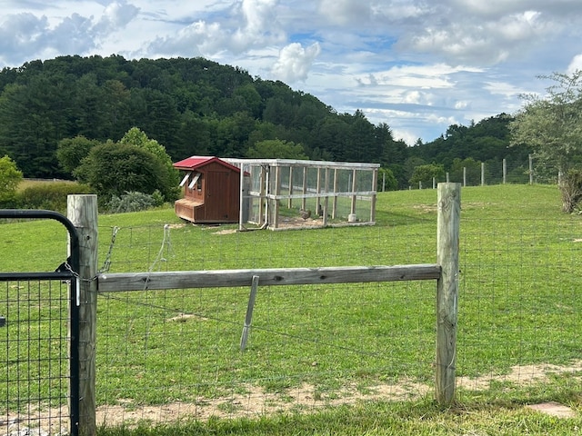 3950 Boyd Rd, Draper, VA 24324 - view of yard featuring an outdoor structure, a view of trees, a view of rural / pastoral area, and exterior structure