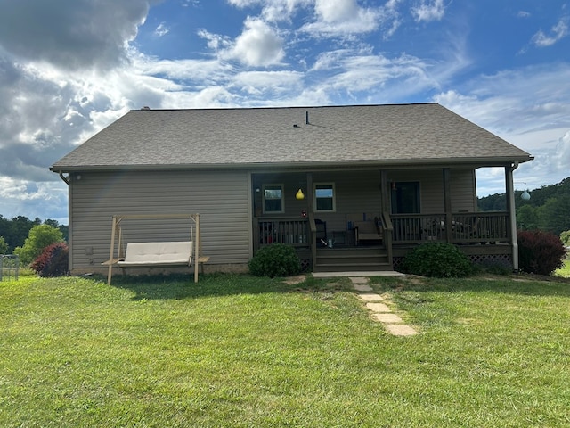 3950 Boyd Rd, Draper, VA 24324 - back of house with a lawn, covered porch, and roof with shingles