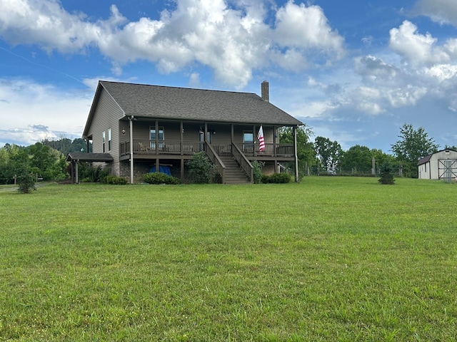 3950 Boyd Rd, Draper, VA 24324 - back of property featuring a lawn and a chimney